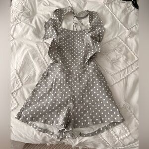 Hot spot polka dot pocketed cotton romper
